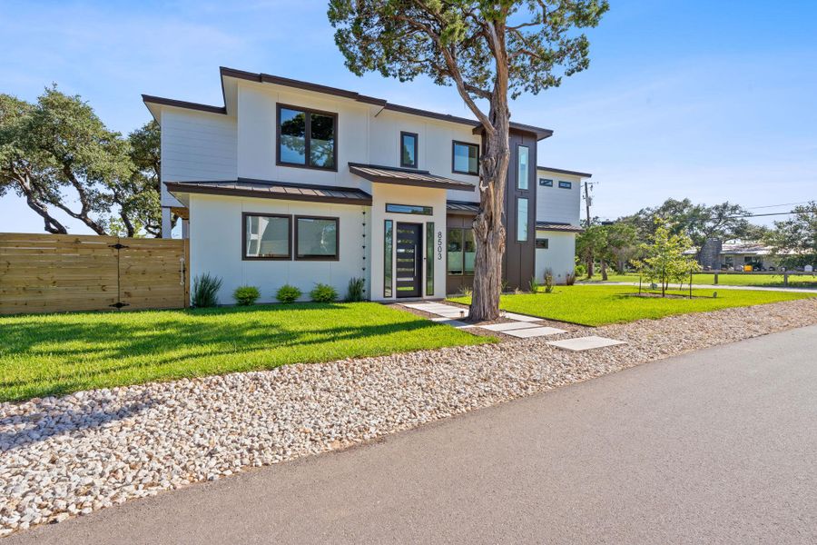 High up, flat lot, A sleek, contemporary exterior with oversized windows, designed for views and natural light. High up, flat lot, A sleek, contemporary exterior with oversized windows, designed for views and natural light.