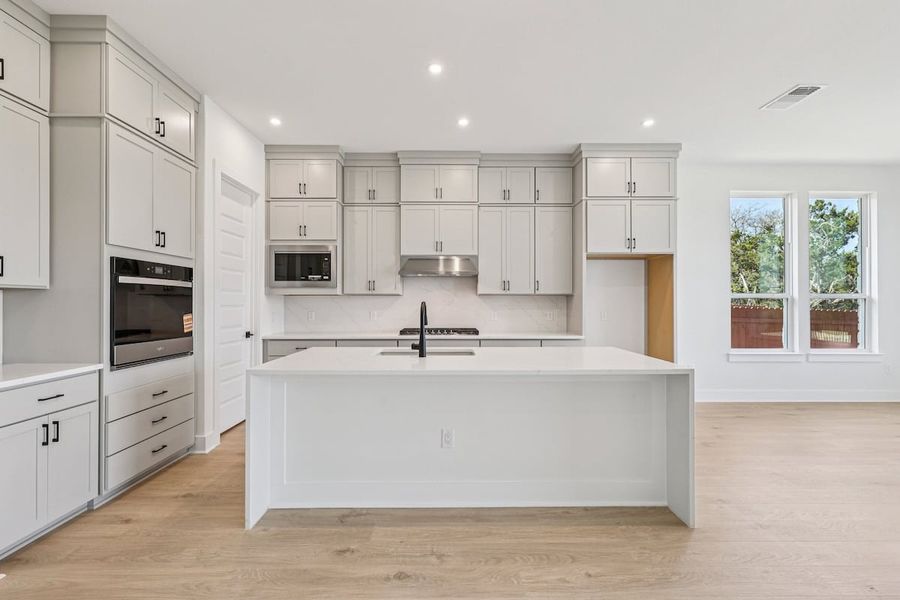 Furnished interior view inside a new home in Sauls Ranch, Round Rock (Image 9).