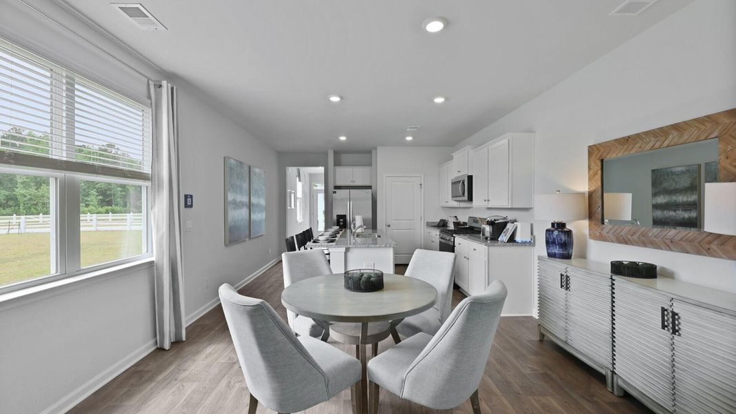 Furnished interior view inside a new home in Pine Hills at Cane Bay, Summerville (Image 13). Furnished interior view inside a new home in Pine Hills at Cane Bay, Summerville (Image 13).