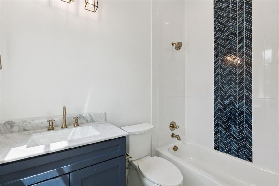 All bedrooms include an ensuite bath and walk-in closet.