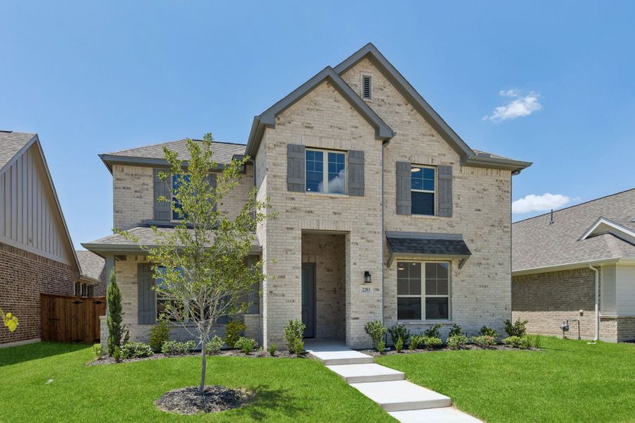 Front exterior of a new home in Dove Hollow, Waxahachie, TX, highlighting curb appeal (Image 20).