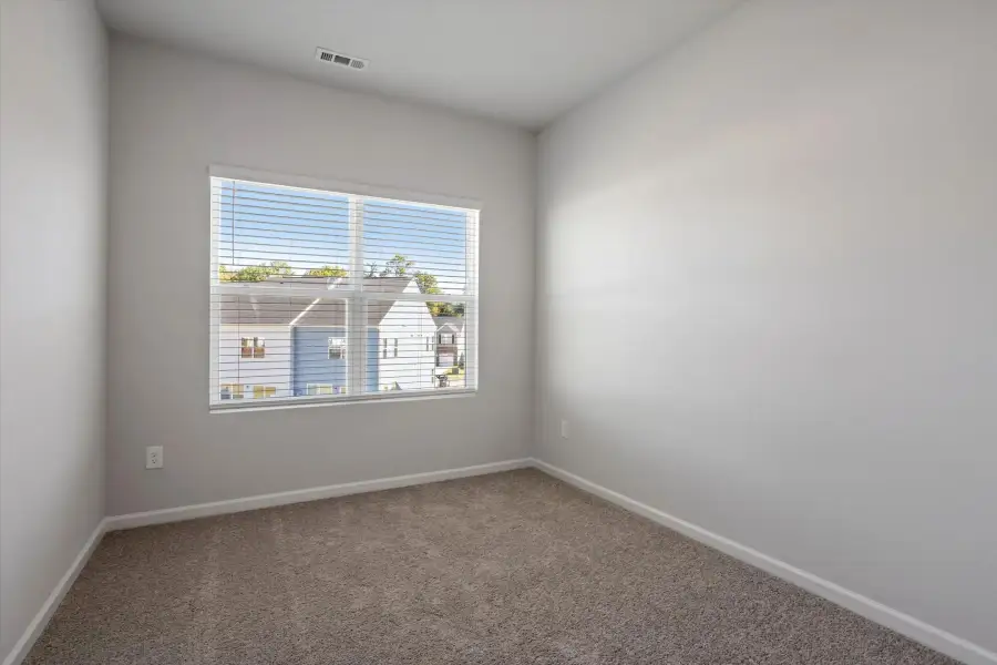 Spacious, unfurnished interior of a new home in West Main Townhomes, Sanford (Image 26).