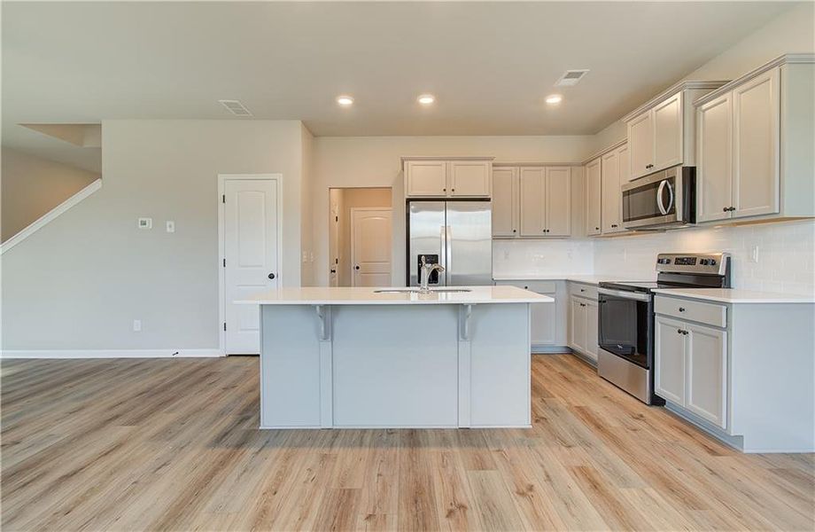 Furnished interior view inside a new home in Towne Center, Hampton (Image 7).