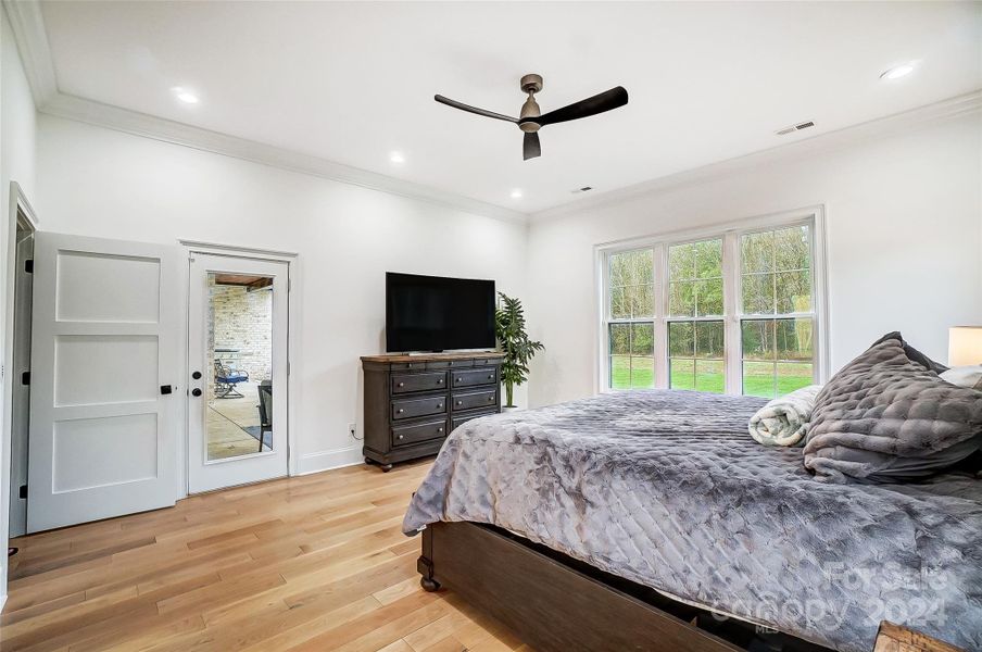 Primary bedroom with access to back porch