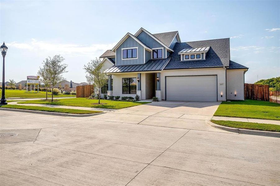 View of front of house featuring a front lawn