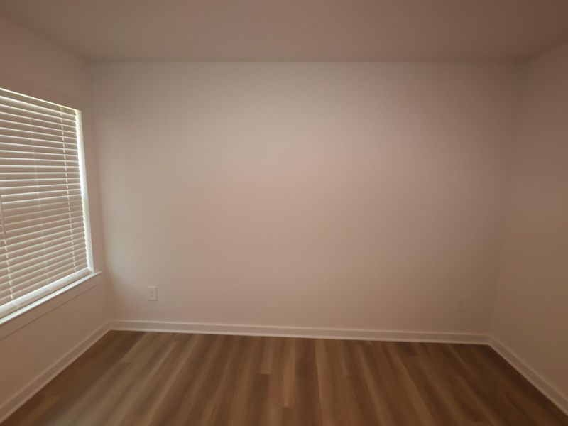 Spacious, unfurnished interior of a new home in Pinewood at Grand Texas, New Caney (Image 11).