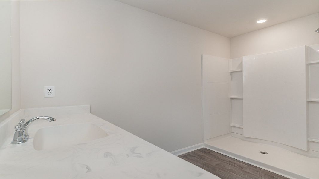 Furnished interior view inside a new home in Stanbury Creek, Supply (Image 9).