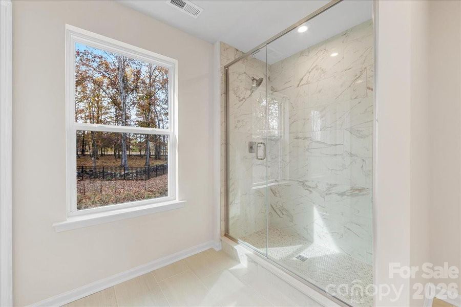 Tile Surround Primary Walk-In Shower.