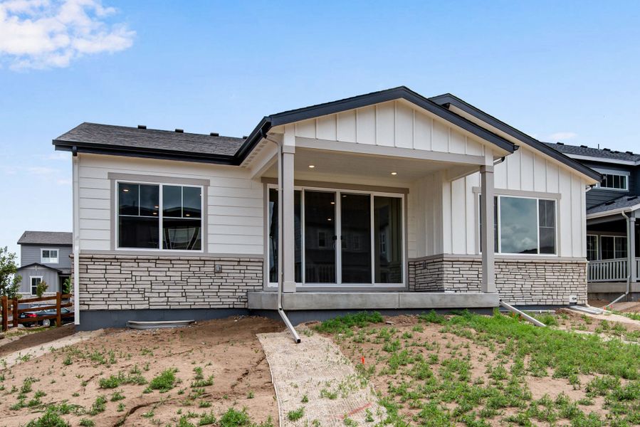 Exterior details and patio area of a home in The Aurora Highlands, Aurora (Image 23).