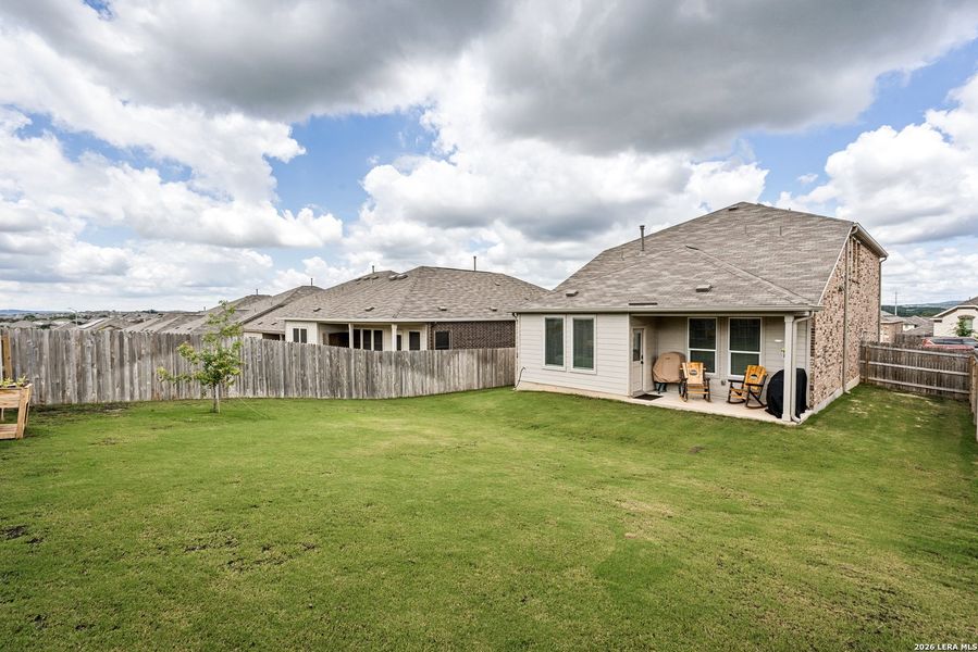 Exterior details and patio area of a home in Hidden Trails, Bulverde (Image 4).