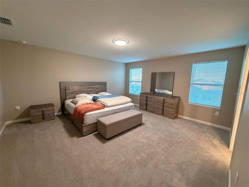 Furnished interior view inside a new home in Waterbrooke, Clermont (Image 6).