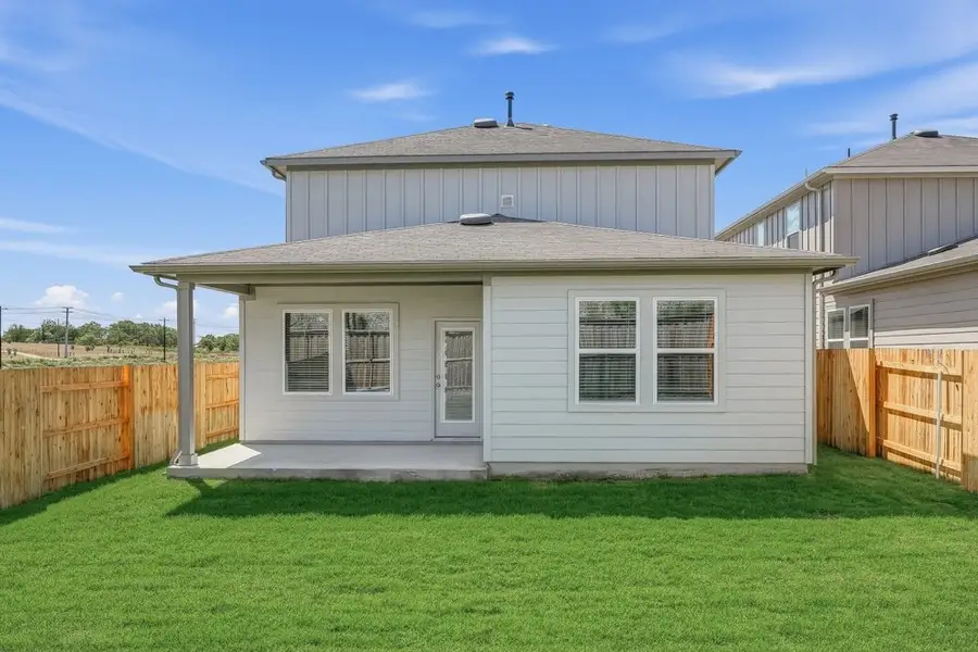 Exterior details and patio area of a home in Sunfield, Buda (Image 26).