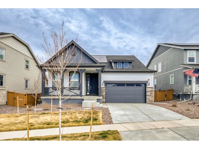 Front exterior of a new home in Sunset Village, Erie, CO, highlighting curb appeal (Image 2).
