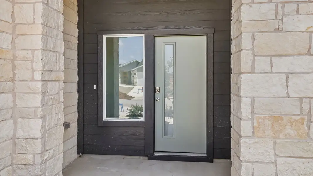 Exterior details and patio area of a home in Southgrove, Kyle (Image 3).