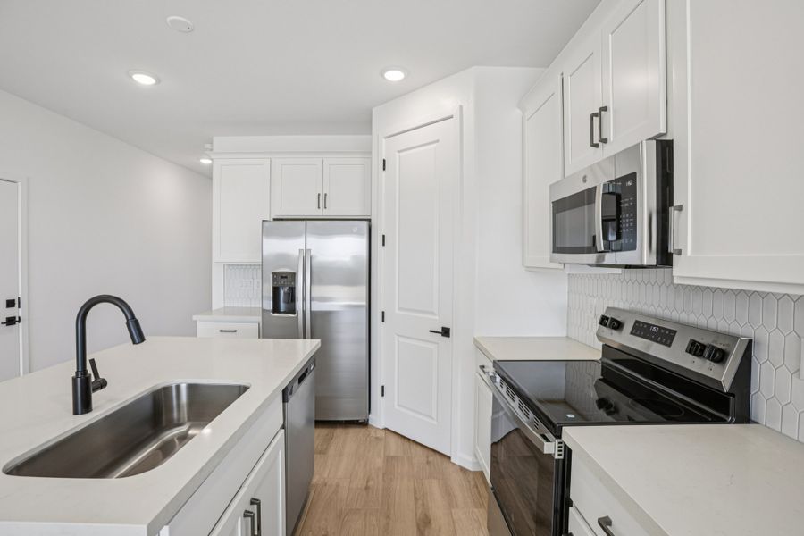 Kitchen featuring the Harmony Collection. Finishes and options may vary by community.