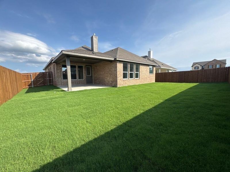 Exterior details and patio area of a home in Cedar Ridge Estates, Anna (Image 4).