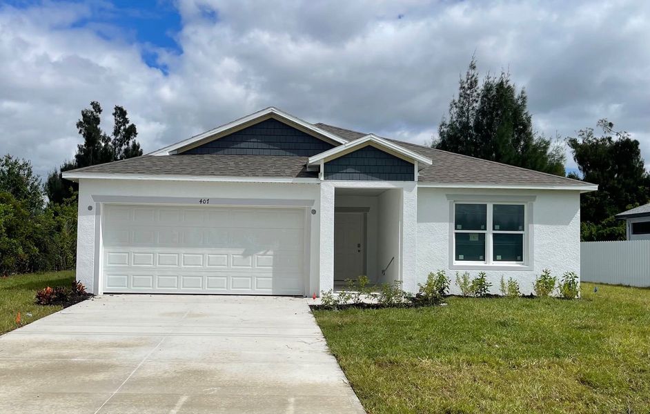 Front exterior of a new home in Cape Coral, Cape Coral, FL, highlighting curb appeal (Image 2).