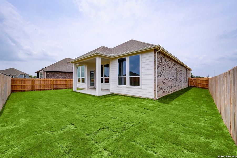 Exterior details and patio area of a home in Venado Crossing, Cibolo (Image 2).