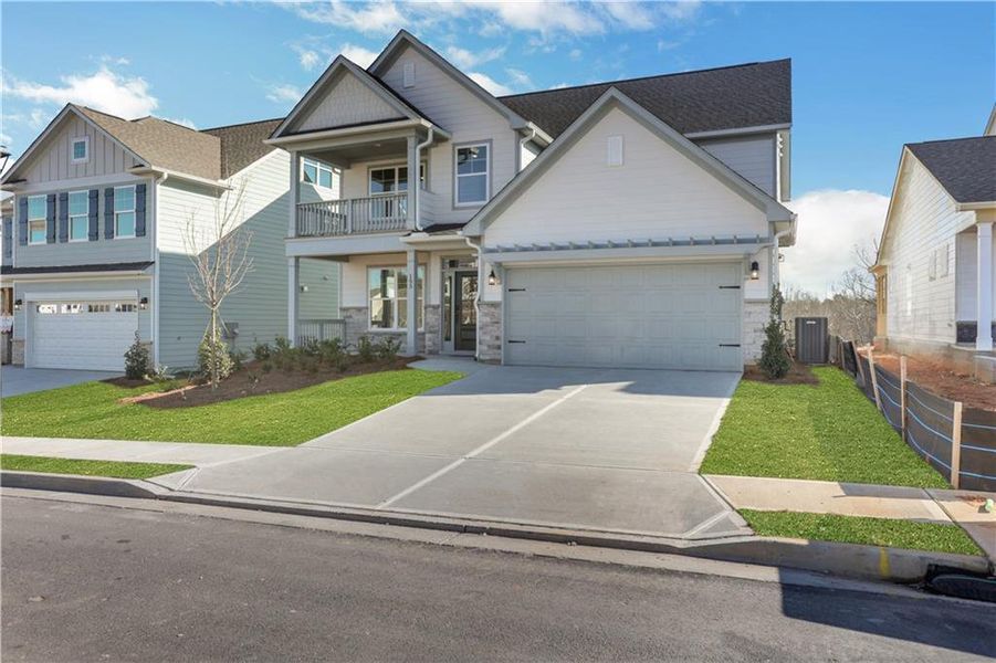 Front exterior of a new home in Twin Lakes, Hoschton, GA, highlighting curb appeal (Image 21).