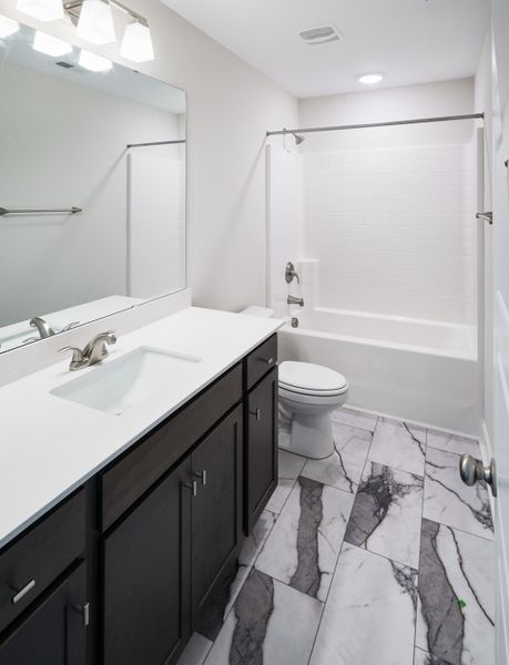 Representative furnished interior of a home built from the The Holland by Cothran Homes in Holly Ridge, Greenville (Image 9).
