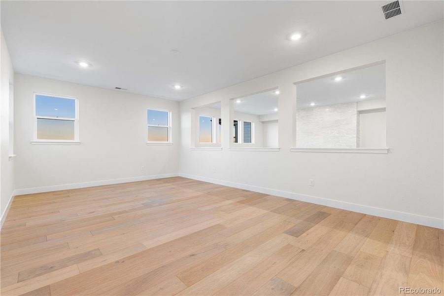 Spacious, unfurnished interior of a new home in Autograph at Lyric, Lone Tree (Image 21).