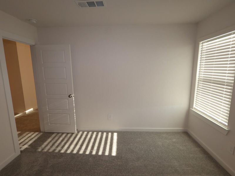 Spacious, unfurnished interior of a new home in Pinewood at Grand Texas, New Caney (Image 12).