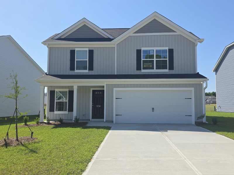 Front exterior of a new home in Rivers Crossing, Aiken, SC, highlighting curb appeal (Image 2). Front exterior of a new home in Rivers Crossing, Aiken, SC, highlighting curb appeal (Image 2).