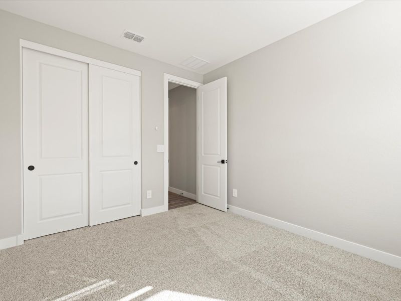 Spacious, unfurnished interior of a new home in White Tank Foothills Reserve Series, Waddell (Image 15).