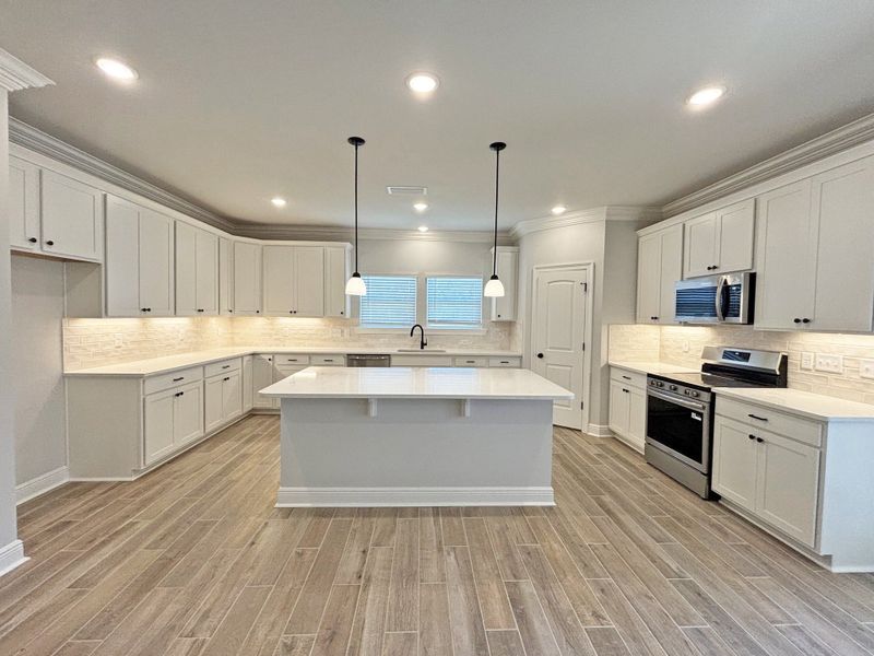 Furnished interior view inside a new home in Natureview, Freeport (Image 13).