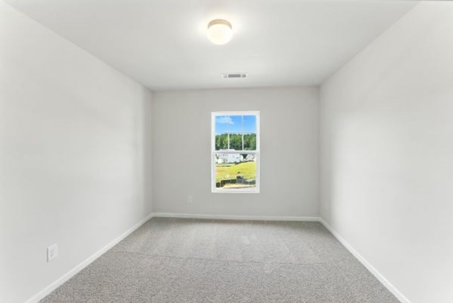 Representative unfurnished interior of a home built from the Brentwood by Piedmont Residential in Falls Creek, Flowery Branch (Image 32).