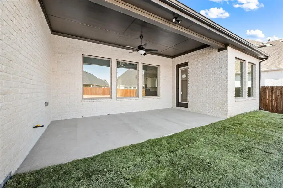 Exterior details and patio area of a home in Parks of Aledo, Aledo (Image 3).