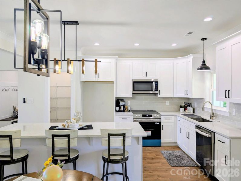 Toward kitchen, with drop zone on left, then pantry, then refrig space. Toward kitchen, with drop zone on left, then pantry, then refrig space.