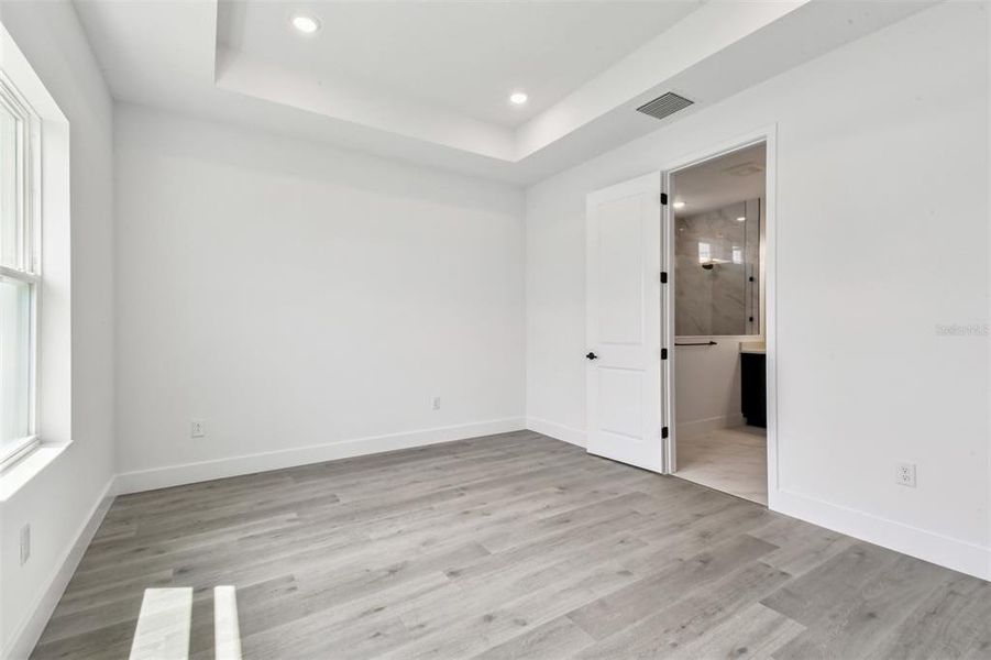 Spacious, unfurnished interior of a new home in The Peninsula at Rhodine Lake, Riverview (Image 32).