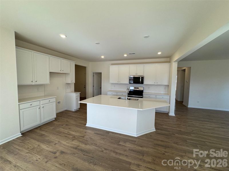 Furnished interior view inside a new home in McFarland Estates, York (Image 10).