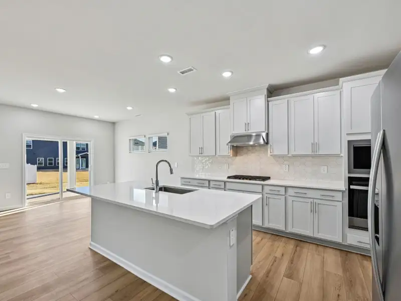 Furnished interior view inside a new home in Oak Manor - Signature Series, Garner (Image 3). Furnished interior view inside a new home in Oak Manor - Signature Series, Garner (Image 3).
