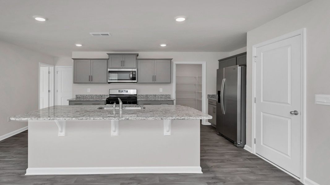 Representative furnished interior of a home built from the ROBIE by D.R. Horton in Ferry Grove, Lexington (Image 4).