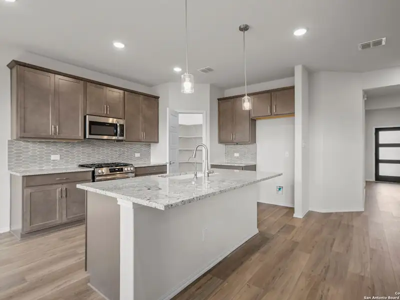 Furnished interior view inside a new home in Comanche Ridge, San Antonio (Image 6).