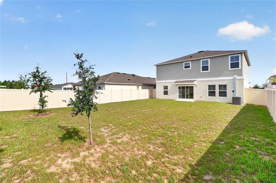 Exterior details and patio area of a home in Scenic Terrace, Haines City (Image 3).