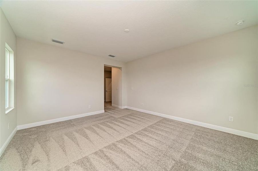 Spacious, unfurnished interior of a new home in North River Ranch, Parrish (Image 21).