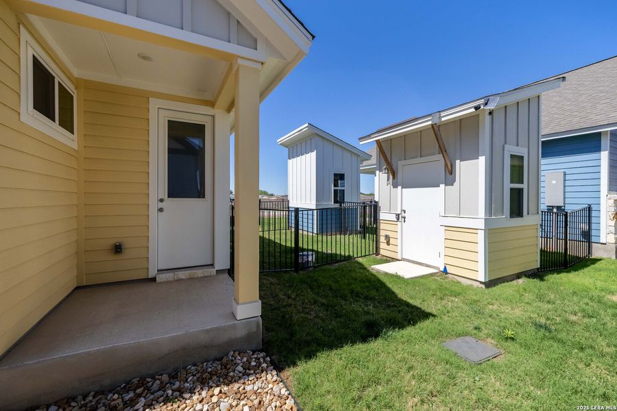 Exterior details and patio area of a home in , New Braunfels (Image 20).