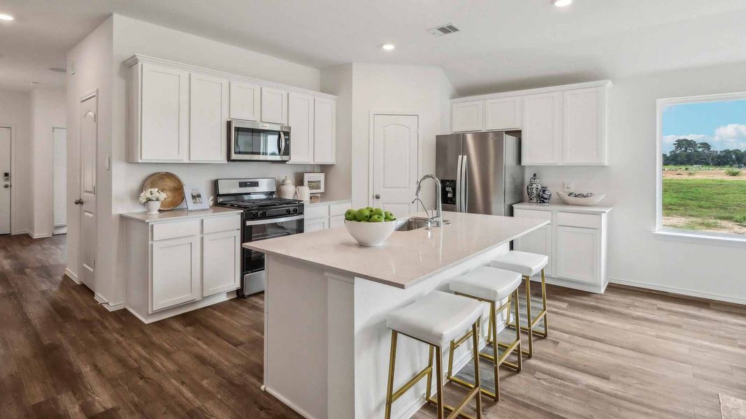 Furnished interior view inside a new home in Sunterra, Katy (Image 11).