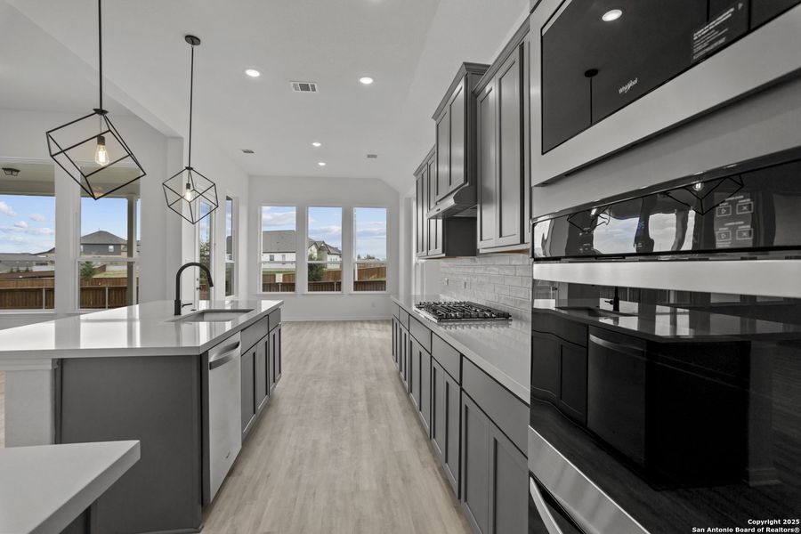 Furnished interior view inside a new home in Homestead 75', Schertz (Image 12).