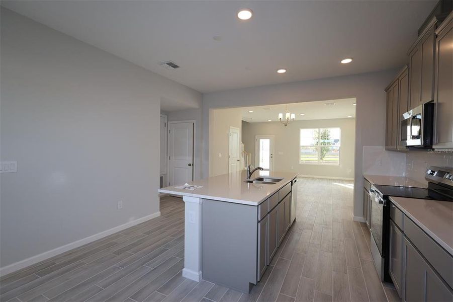 Furnished interior view inside a new home in Tribute at Ovation, Winter Garden (Image 8). Furnished interior view inside a new home in Tribute at Ovation, Winter Garden (Image 8).