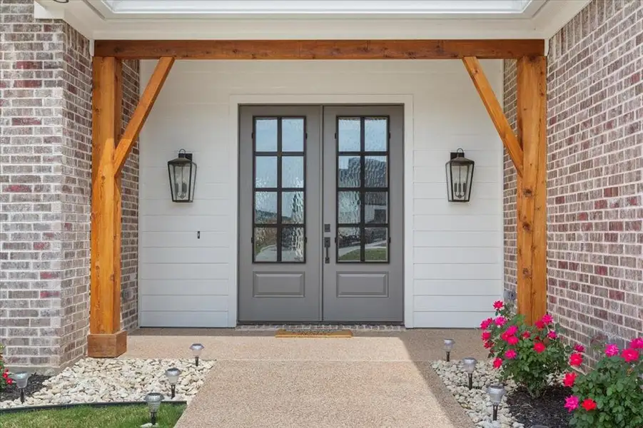 Exterior details and patio area of a home in , Woodway (Image 26). Exterior details and patio area of a home in , Woodway (Image 26).