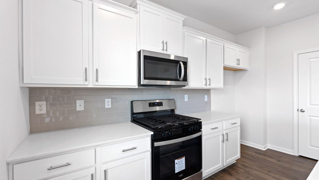 Representative furnished interior of a home built from the BELHAVEN by D.R. Horton in Benjamin's Grove, Woodruff (Image 12).