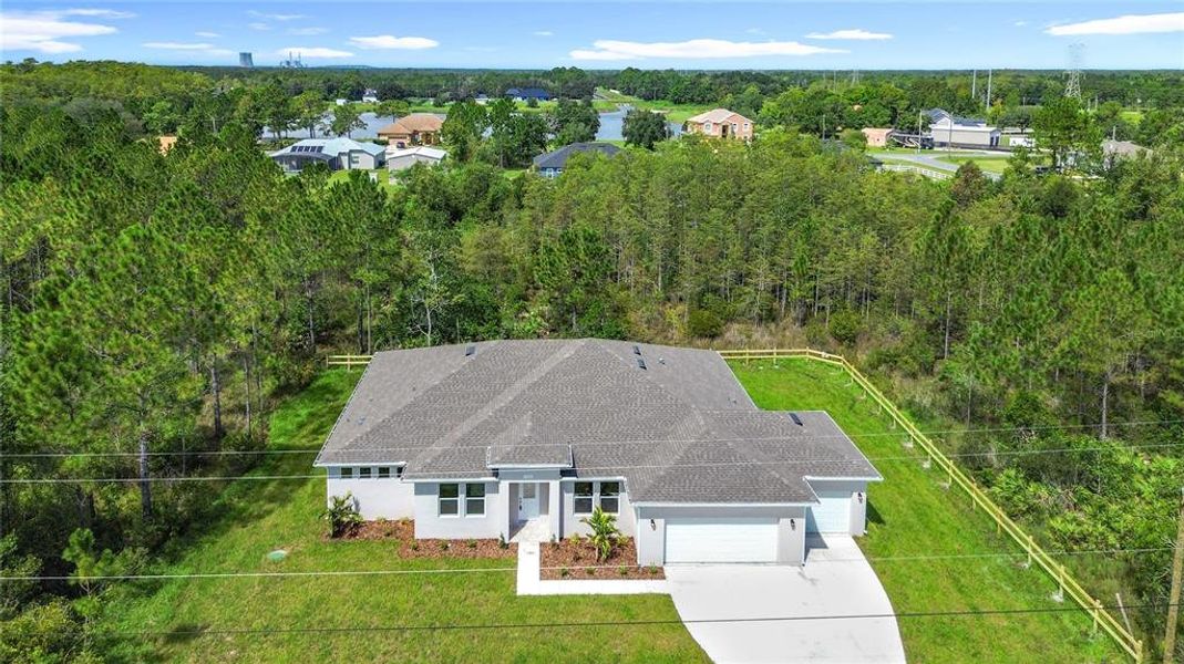 Front exterior of a new home in , Orlando, FL, highlighting curb appeal (Image 2). Front exterior of a new home in , Orlando, FL, highlighting curb appeal (Image 2).