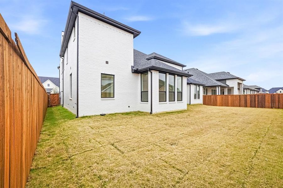 Exterior details and patio area of a home in Sandbrock Ranch, Krugerville (Image 3).