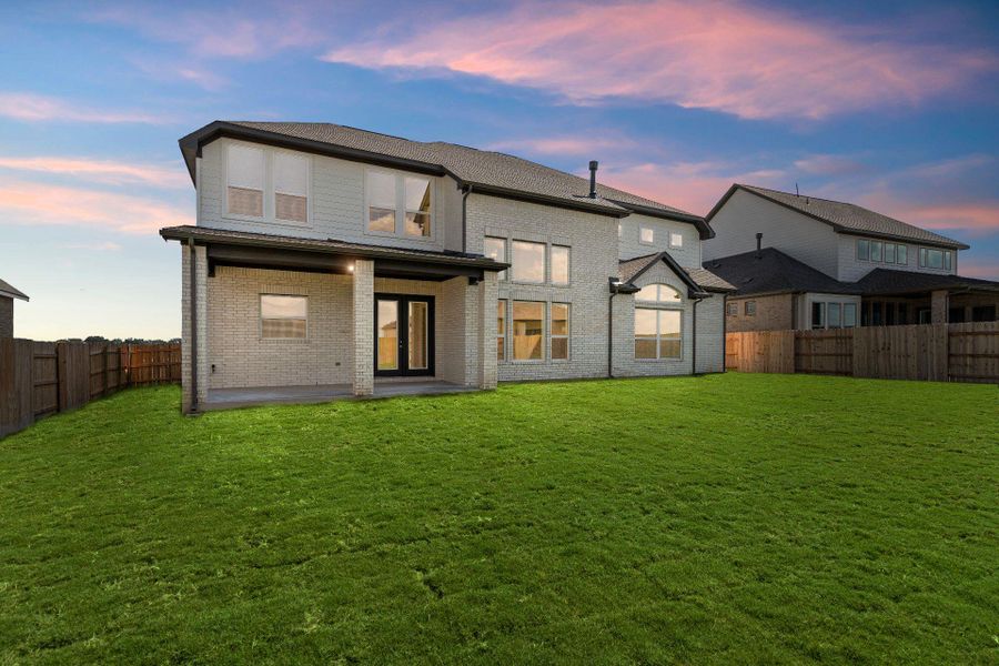 Rear of Home and Private Backyard