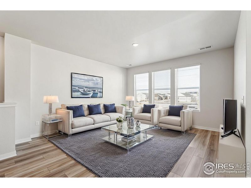 Furnished interior view inside a new home in Kinston Mainstreet Townhomes, Loveland (Image 13).