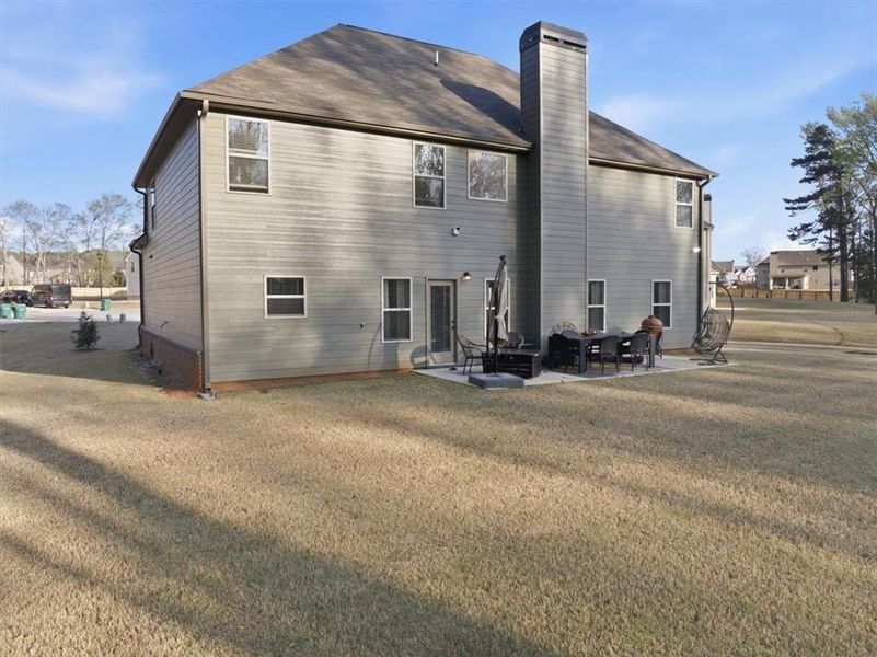 Exterior details and patio area of a home in Nine Oaks, Locust Grove (Image 3).